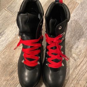 Black boots with red laces